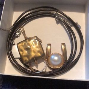 2 brown chokers with pendants